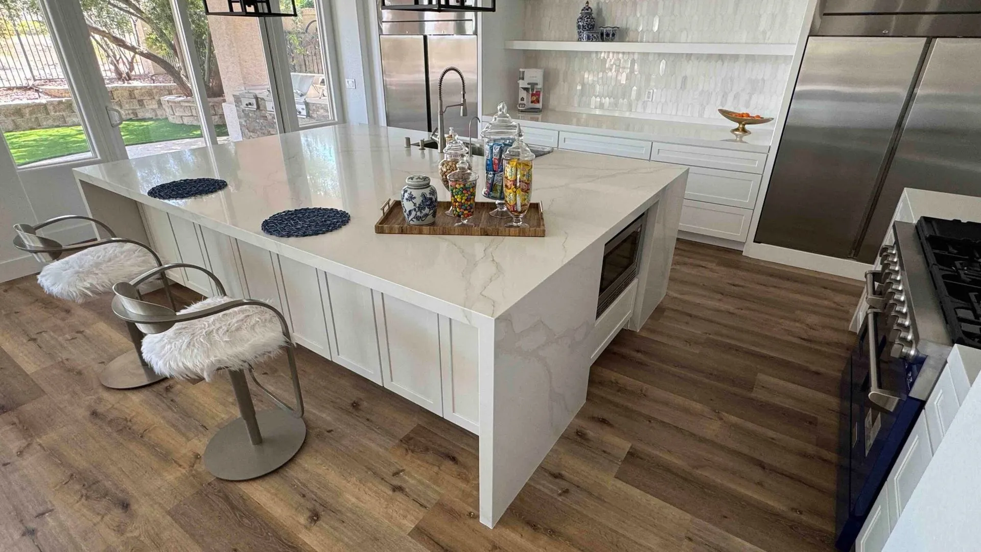 Calacatta gold quartz kitchen countertop with a large island